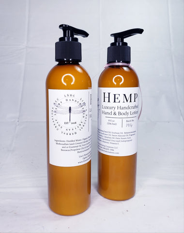 Two amber-colored bottles of hemp-based hand and body lotion with pump dispensers.